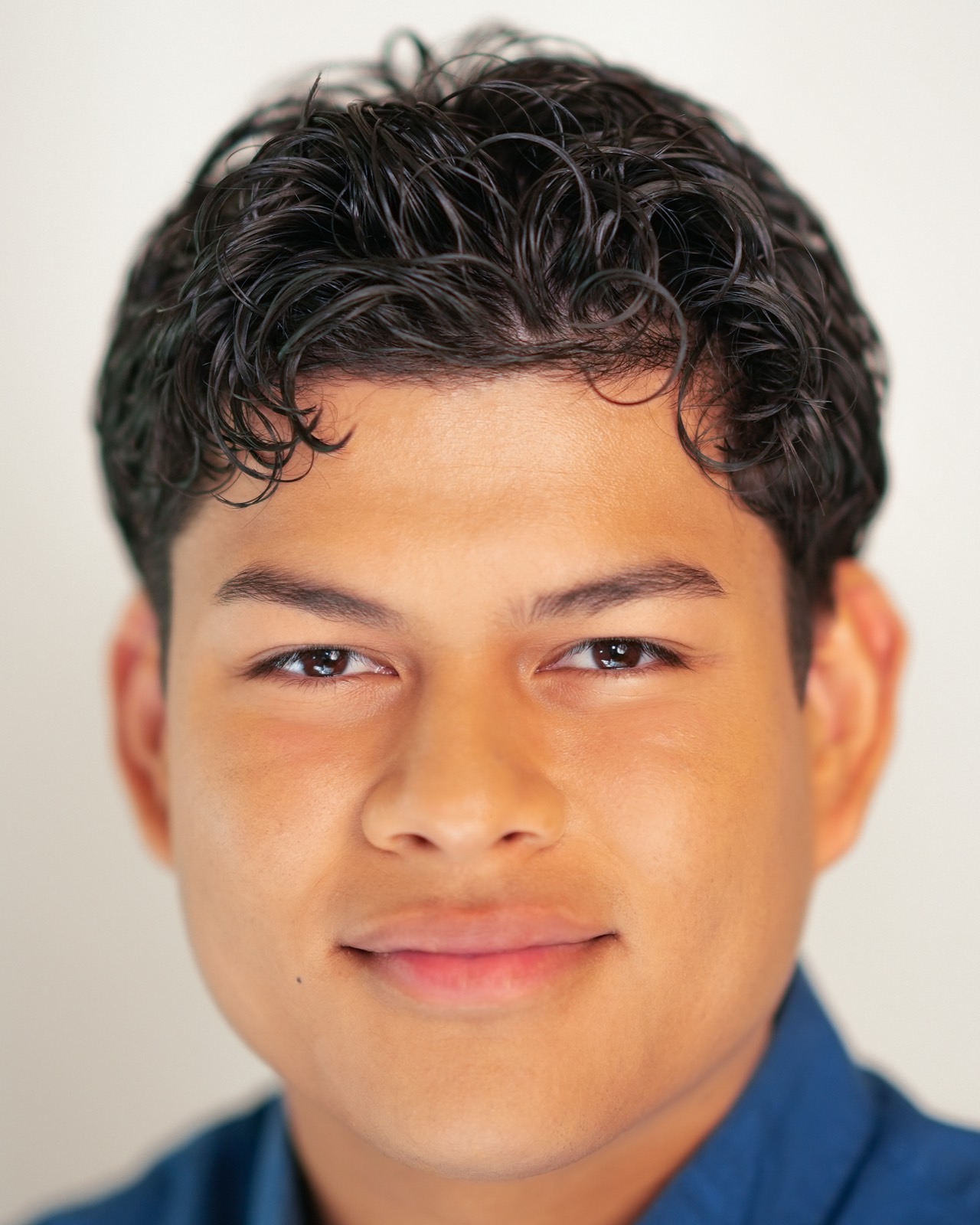 Young actor headshot on a clean white backdrop in Las Vegas